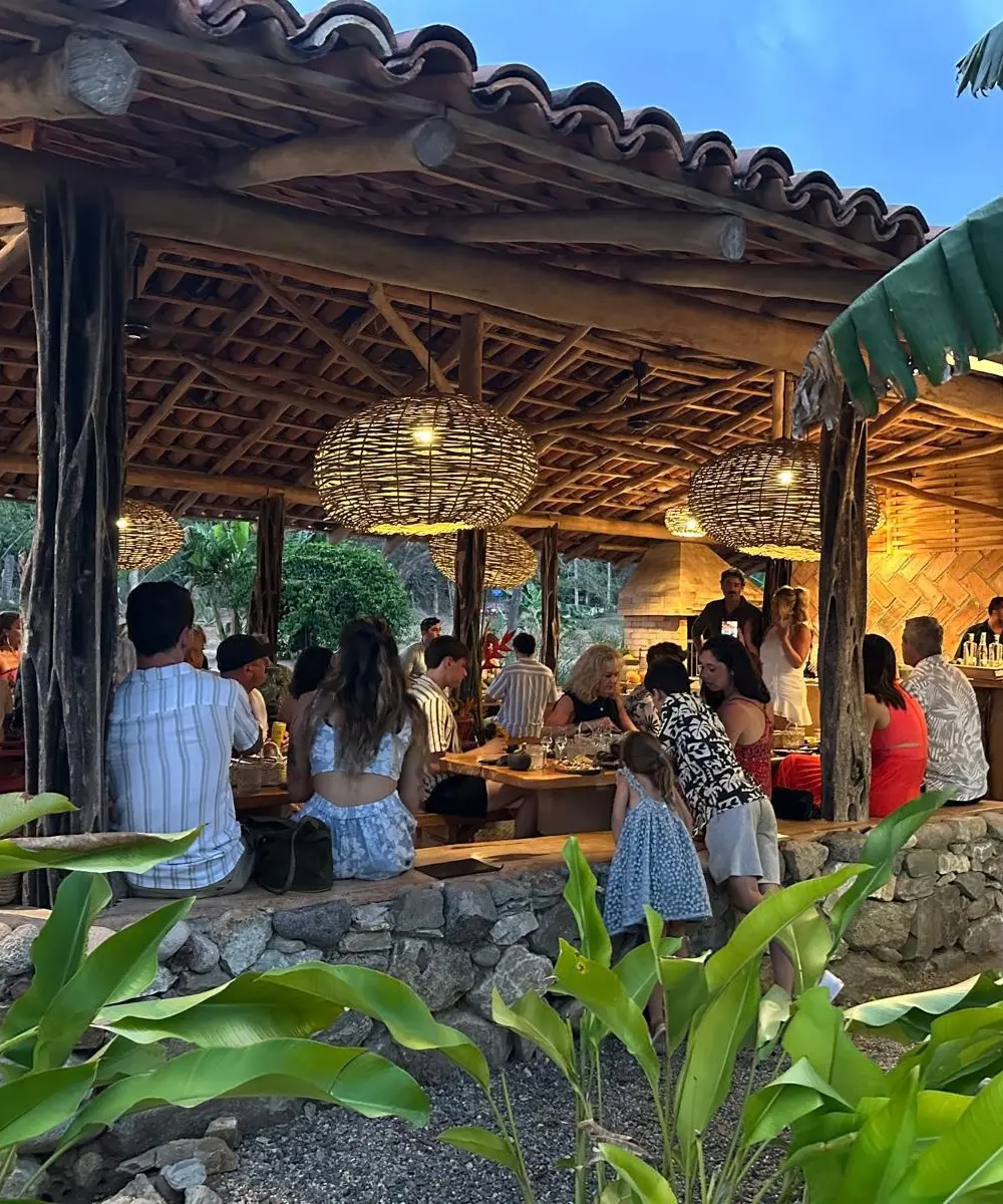 Dinner under the lights in the comedor at Cachasol Farm Distillery
